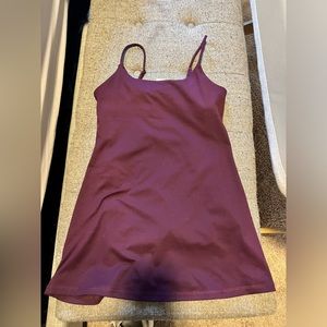 Garage purple (eggplant) color sporty dress with built in shorts and has pockets